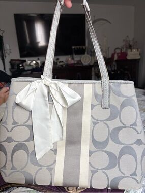 Gray C Patterned Coach Tote with Ivory Bow Accent.